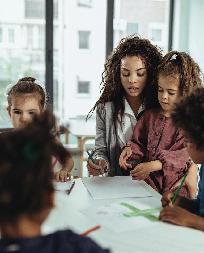 A Family Affair teacher working with school-age children
